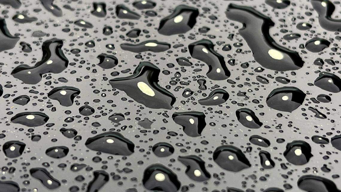 The N.C. Department of Environmental Quality this season reported the two highest tree pollen levels since it started measuring them in 1999. Here, pollen sits on rain drops on the trunk of a car in Raleigh, N.C., on March 27.