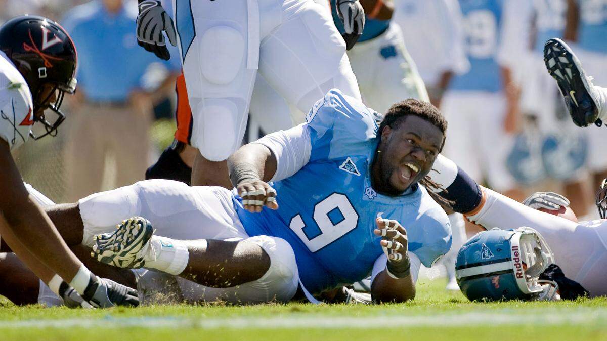 UNC’s Marvin Austin (9), reacting after stopping Virginia’s Mikell Simpson.