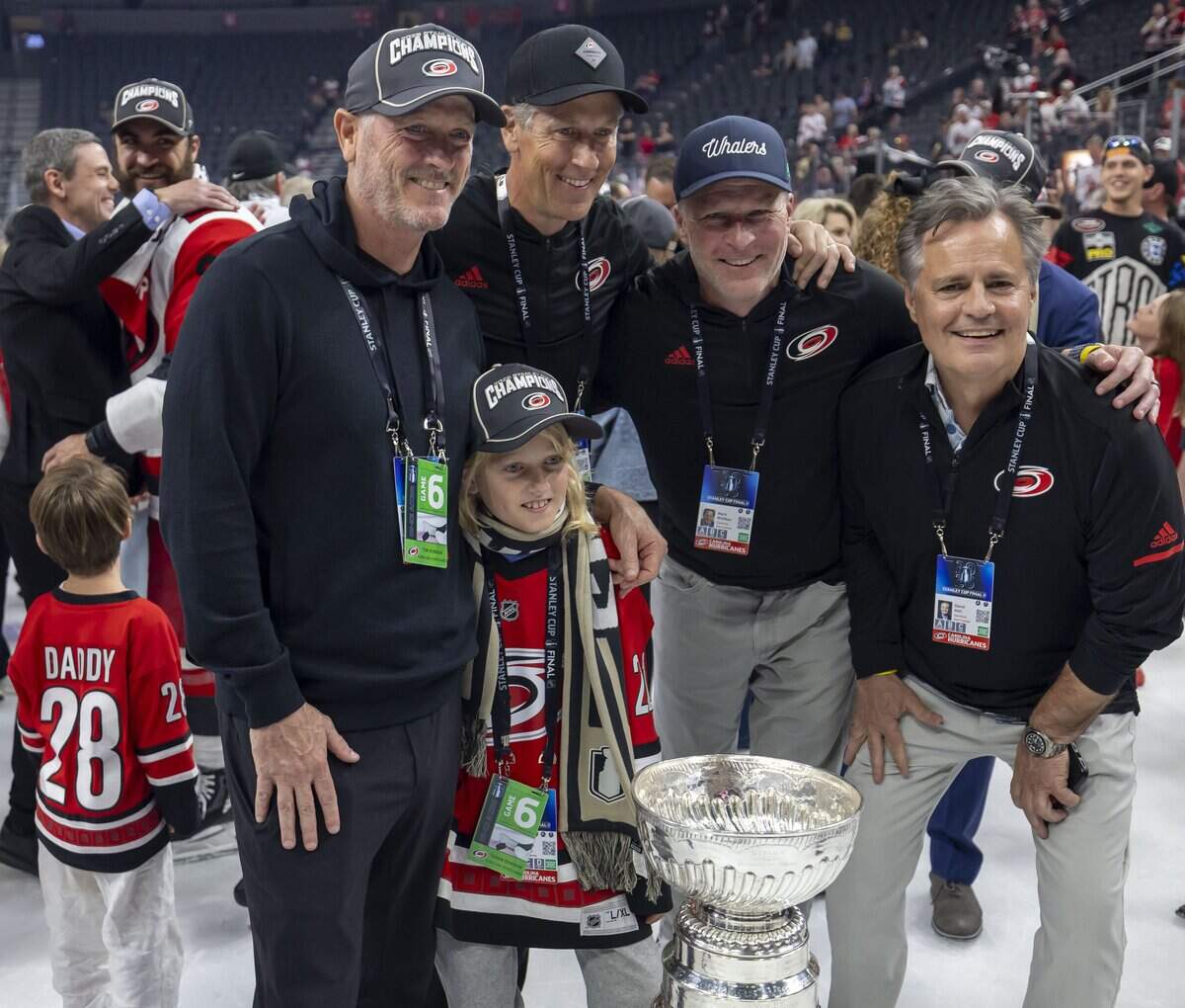 Carolina Hurricanes team owner Tom Dundon and his daughter Tagan Dundon, pose with the Stanley Cup on Sunday, June 14, 2026 at T-Mobile Arena in Las Vegas, NV.