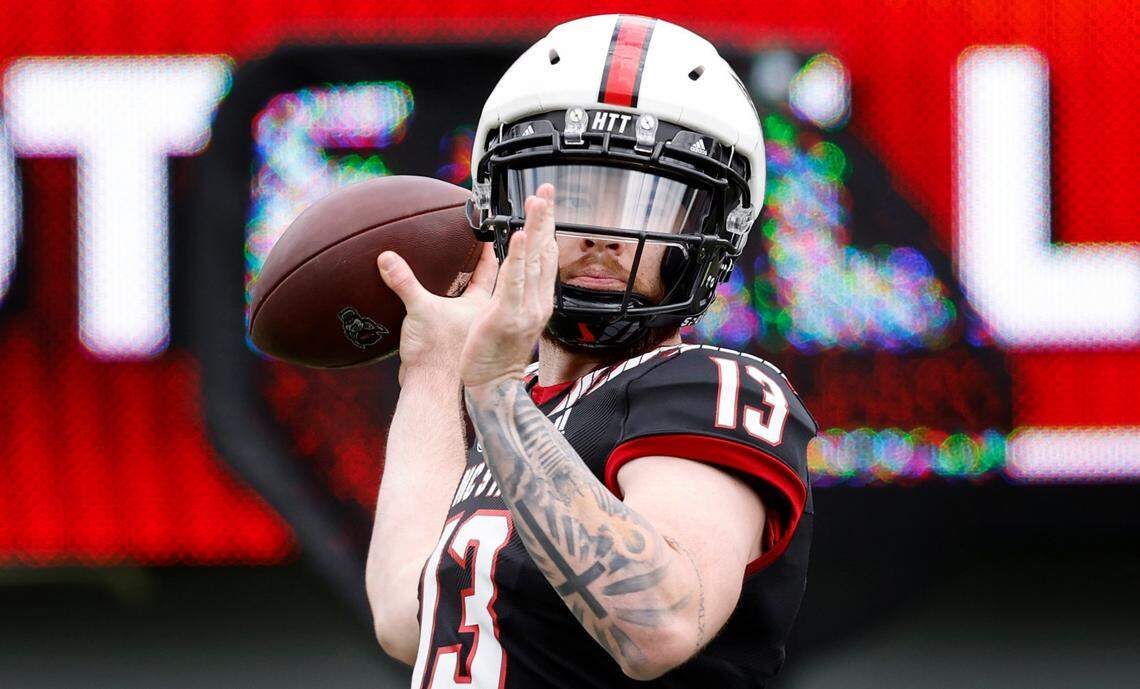 N.C. State quarterback Devin Leary (13) prepares to pass during N.C. State footballís spring game at Carter-Finley Stadium in Raleigh, N.C., Saturday, April 9, 2022.
