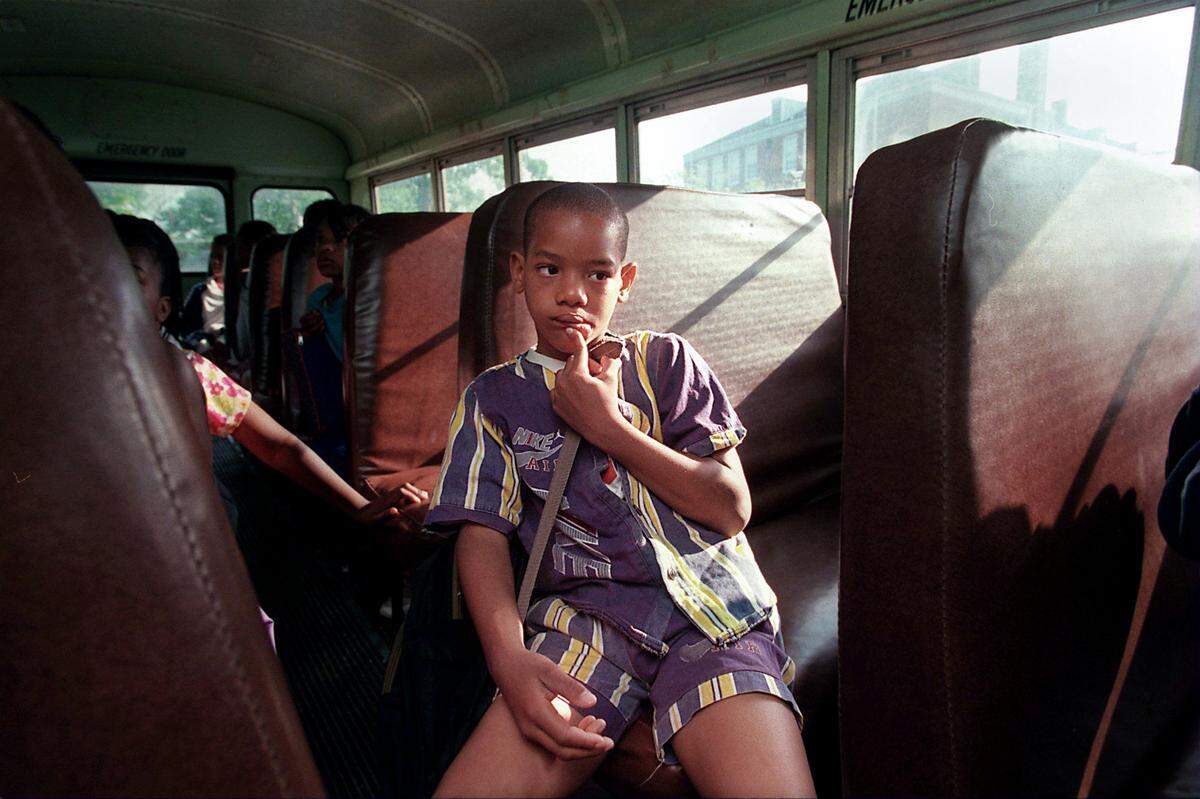Students take the 25 minute ride from Walnut Terrace in southeast Raleigh to Cary Elementary in 1997. 