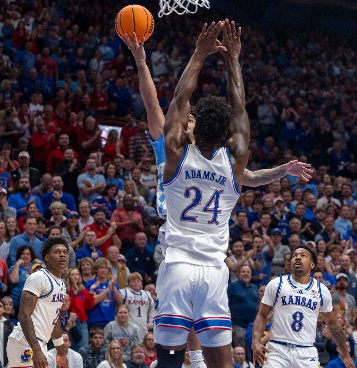 Kansas forward K.J. Adams Jr. (24) defends North Carolina guard Elliot Cadeau (3) in the first half on Friday, November 8, 2024 at Allen Fieldhouse in Lawrence, Kansas.Cadeau (3)