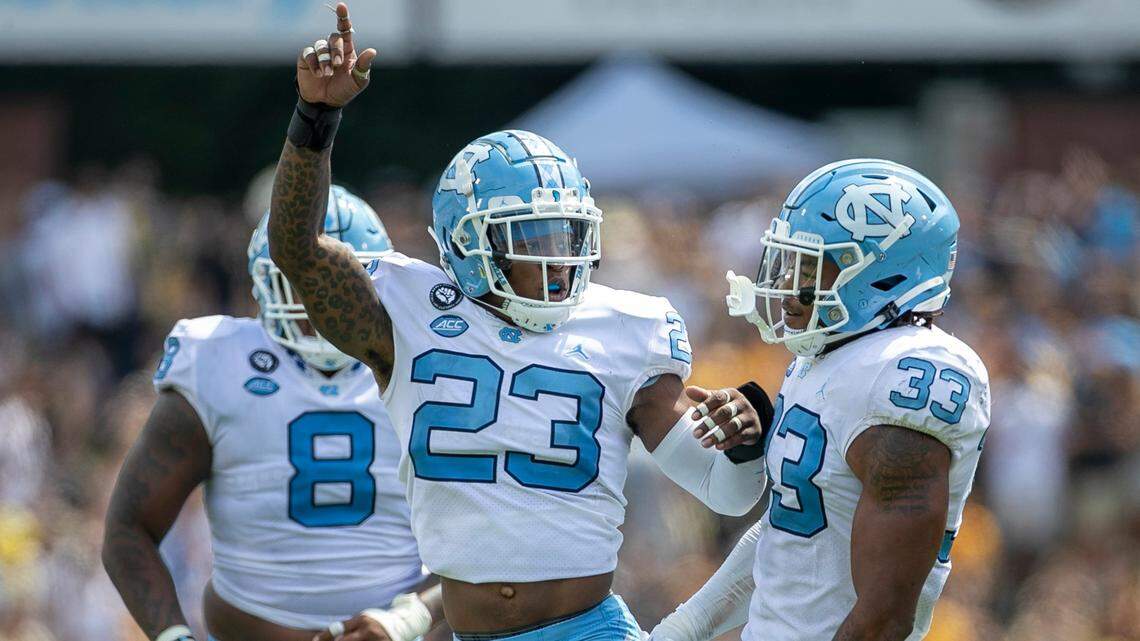 North Carolinas Power Echols (23) celebrates with teammate Cedric Gray (33), after Grays interception in the third quarter on Saturday, September 3, 2022 at Kidd Brewer Stadium in Boone, N.C.