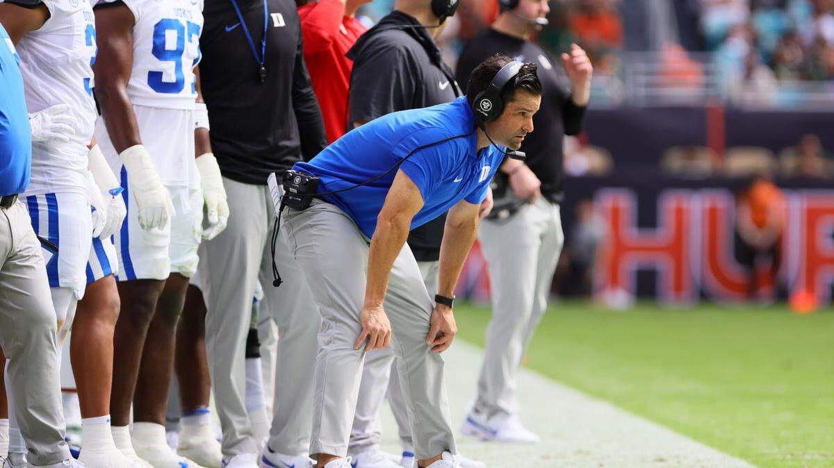 Nov 2, 2024; Miami Gardens, Florida, USA; Duke Blue Devils head coach Manny Diaz watches from the sideline against the Miami Hurricanes during the second quarter at Hard Rock Stadium.