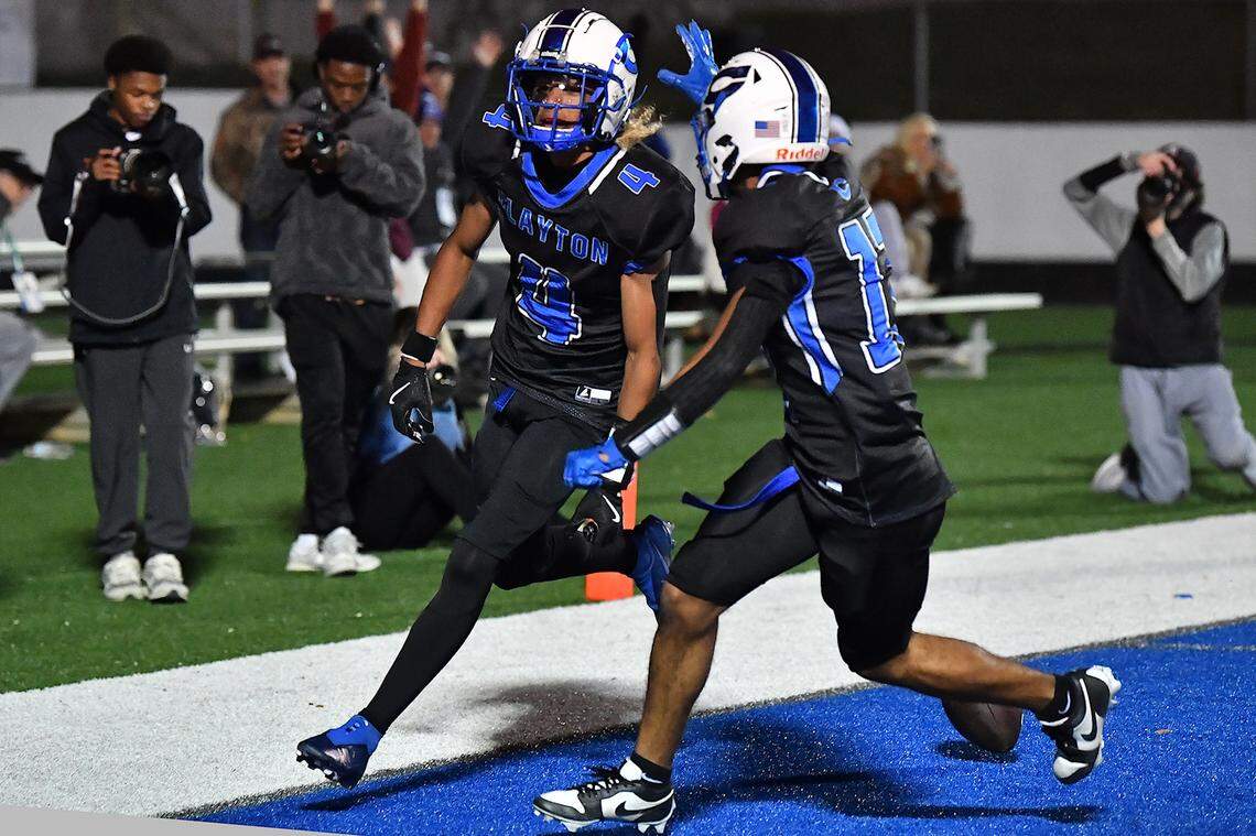 Clayton wide receiver TJ Campbell (4) celebrates with Parker Ferguson (17) after scoring the touchdown during the second half. The Cleveland Rams took on the Clayton Comets in a conference football game in Clayton, N.C. on October 31st in Clayton, N.C.