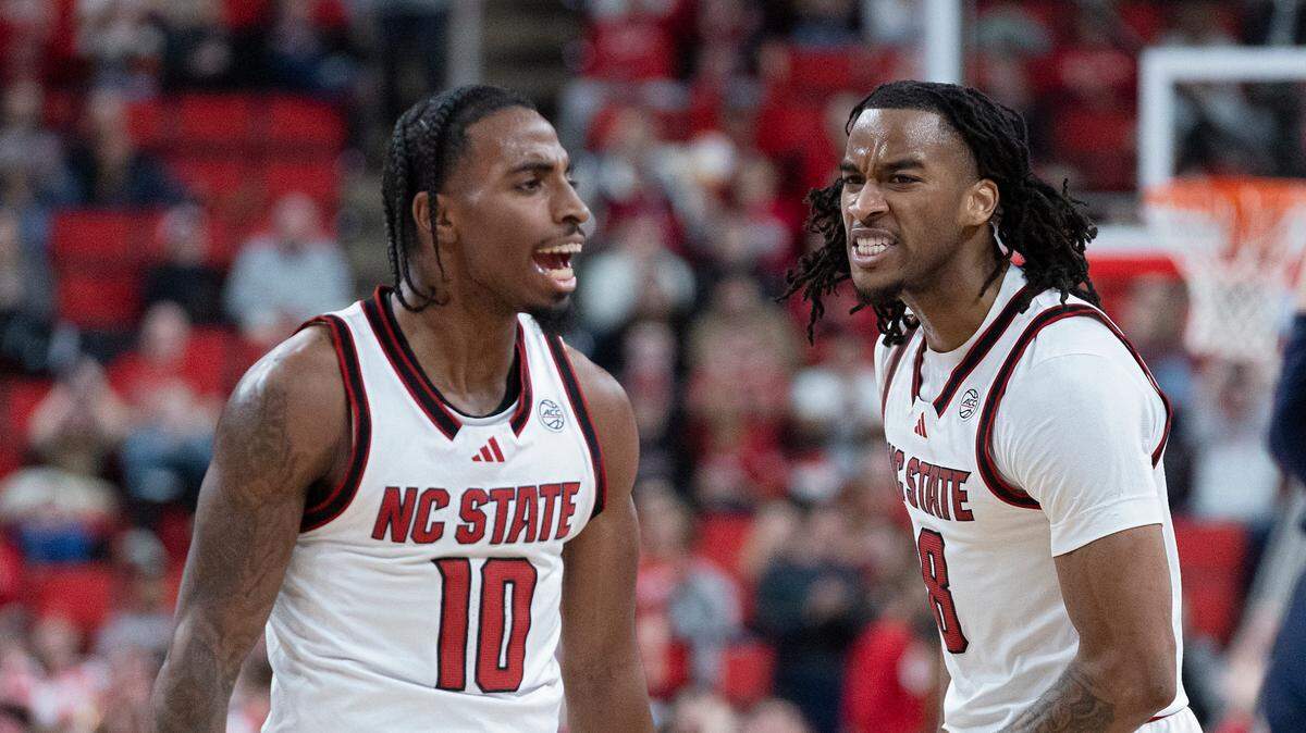 N.C. State’s Marcus Hill and Jayden Taylor react during the second half of the Wolfpack’s 66-65 win over Notre Dame on Wednesday, Jan. 8, 2025, at Lenovo Center in Raleigh, N.C.