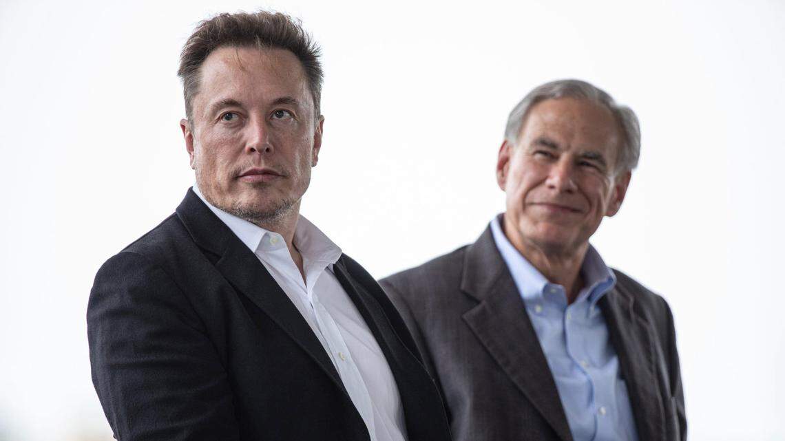 Tesla CEO Elon Musk, left, sits with Texas Gov. Greg Abbott at a groundbreaking ceremony for the auto manufacturer’s Robstown lithium refining facility on Monday, May 8, 2023, in Texas.