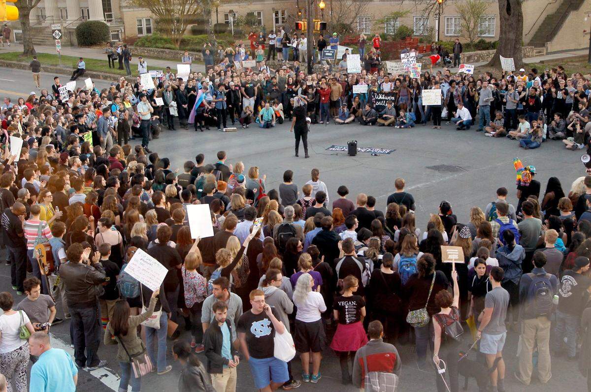 Hundreds attended a rally in Chapel Hill on March 29, 2016 to protest the passage of N.C. House Bill 2, which included a provision requiring people to use the bathroom matching the gender on their birth certificates. The protesters marched from the old post office up Franklin Street to Columbia Street, where they formed a circled and stopped traffic for hours.