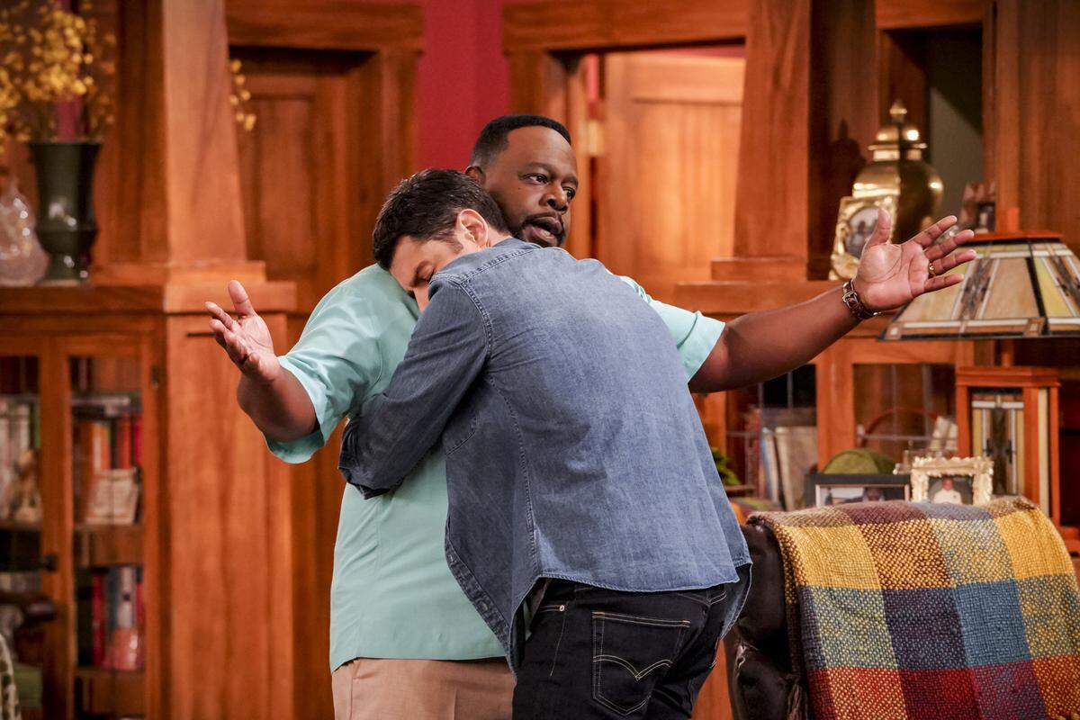 Cedric the Entertainer, left, and Max Greenfield in the CBS comedy “The Neighborhood.”