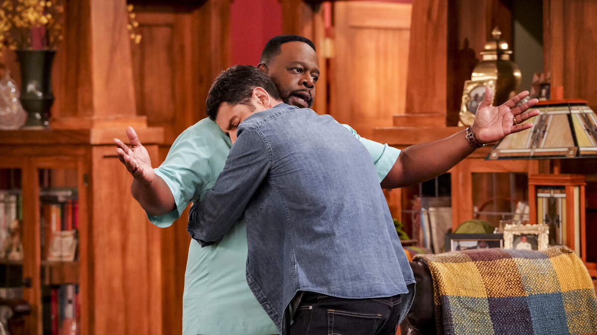 Cedric the Entertainer, left, and Max Greenfield in the CBS comedy “The Neighborhood.”