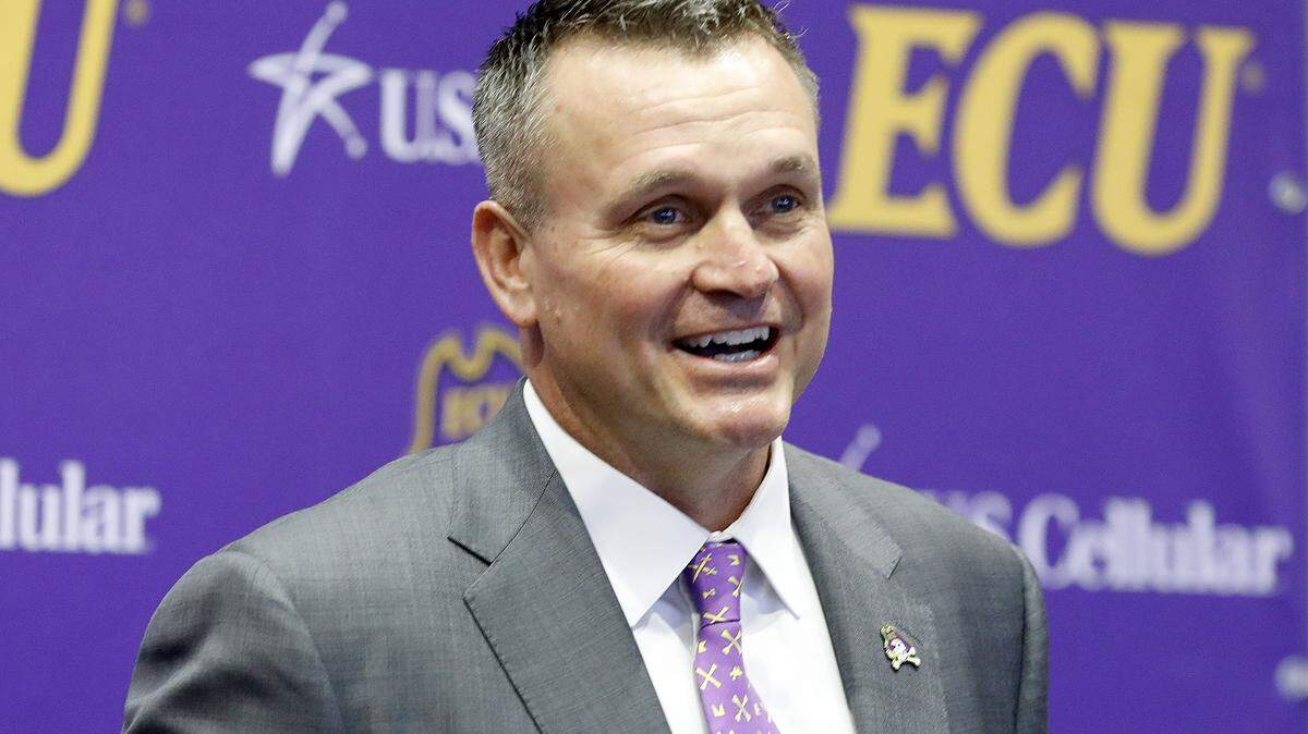 East Carolina football coach Mike Houston speaks after being introduced during a press conference at the Murphy Center at East Carolina University in Greenville, N.C., Tuesday, Dec. 4, 2018.