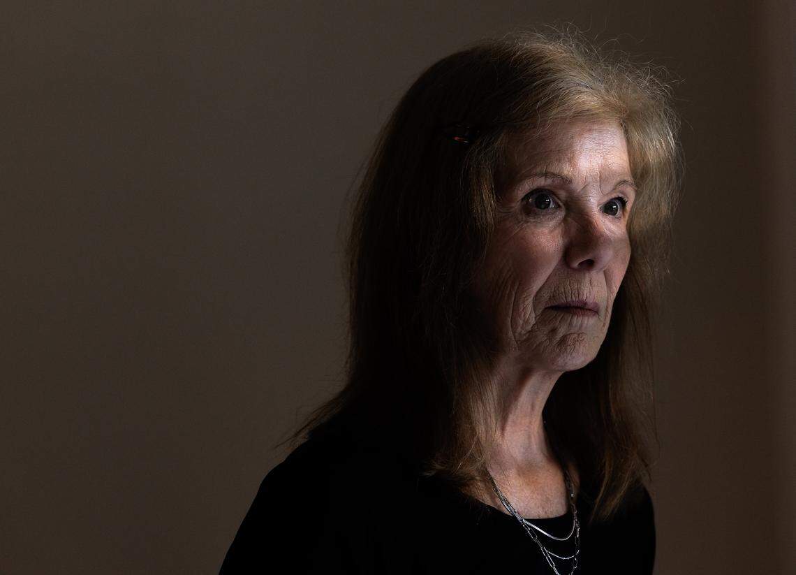 Jill Rohner poses for a portrait at her former home on Wednesday, May 21, 2025, in Raleigh, N.C. Rohner’s partner was fatally shot by her ex-husband, against whom she had a domestic violence protective order, at the home in late January. Her ex-husband shot at responding police from inside the home, and they returned fire, killing him. 