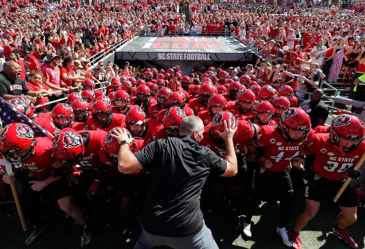 N.C. State head coach Dave Doeren gets ready to lead his team out onto the field before N.C. State’s game against Marshall at Carter-Finley Stadium in Raleigh, N.C., Saturday, Oct. 7, 2023.