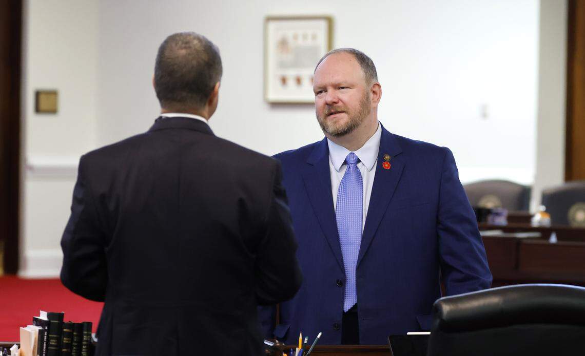 N.C. Sen. Ralph Hise, right, talks with Sen. Warren Daniel before session in the N.C. Senate chamber in the Legislative Building in Raleigh, Tuesday, April 21, 2026.