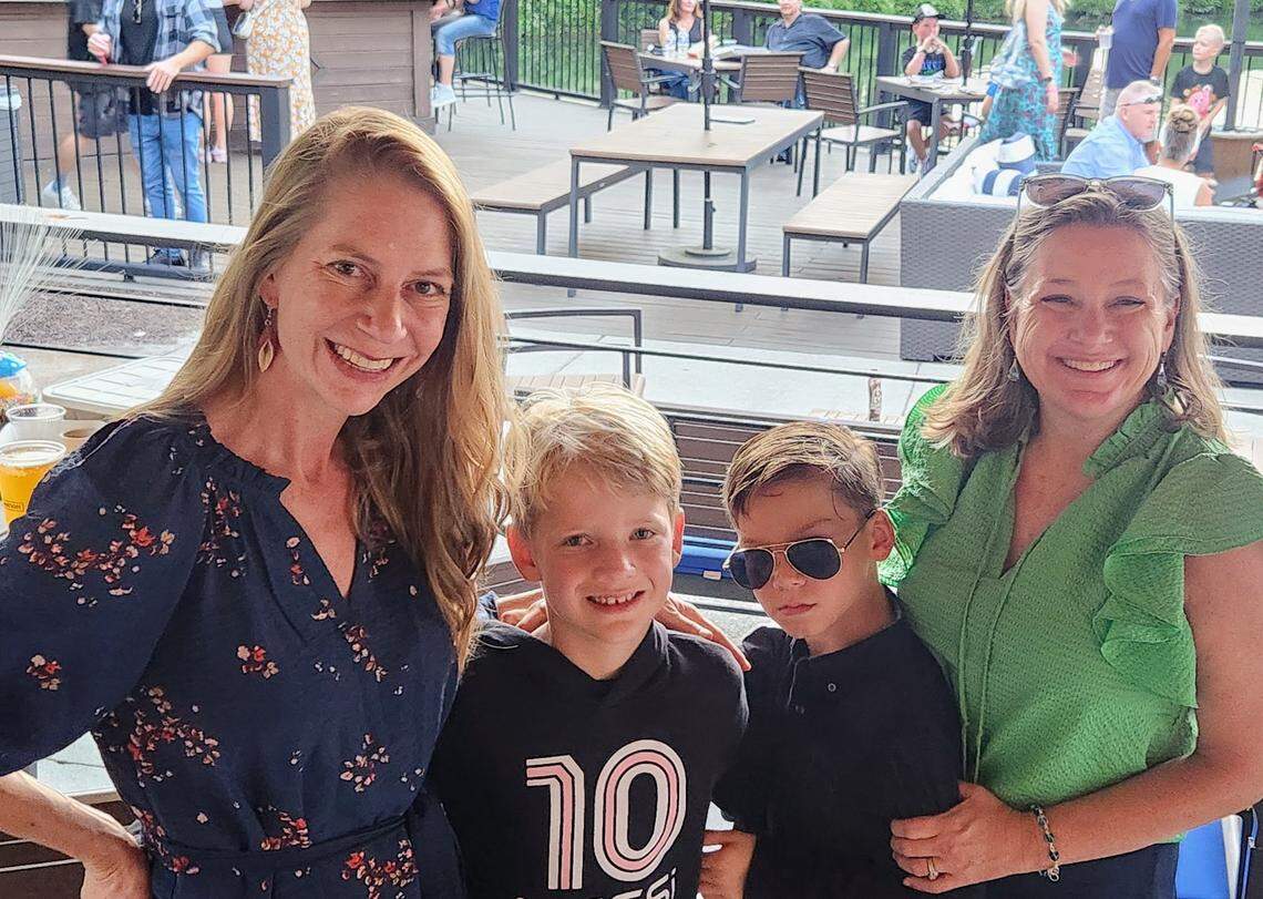 From left to right, Emily Geisen, Bradley Giesen, Jake Harriss and Virginia Bridges waiting for the Imagine Dragons show to start in Virginia Beach on August 26, 2024.