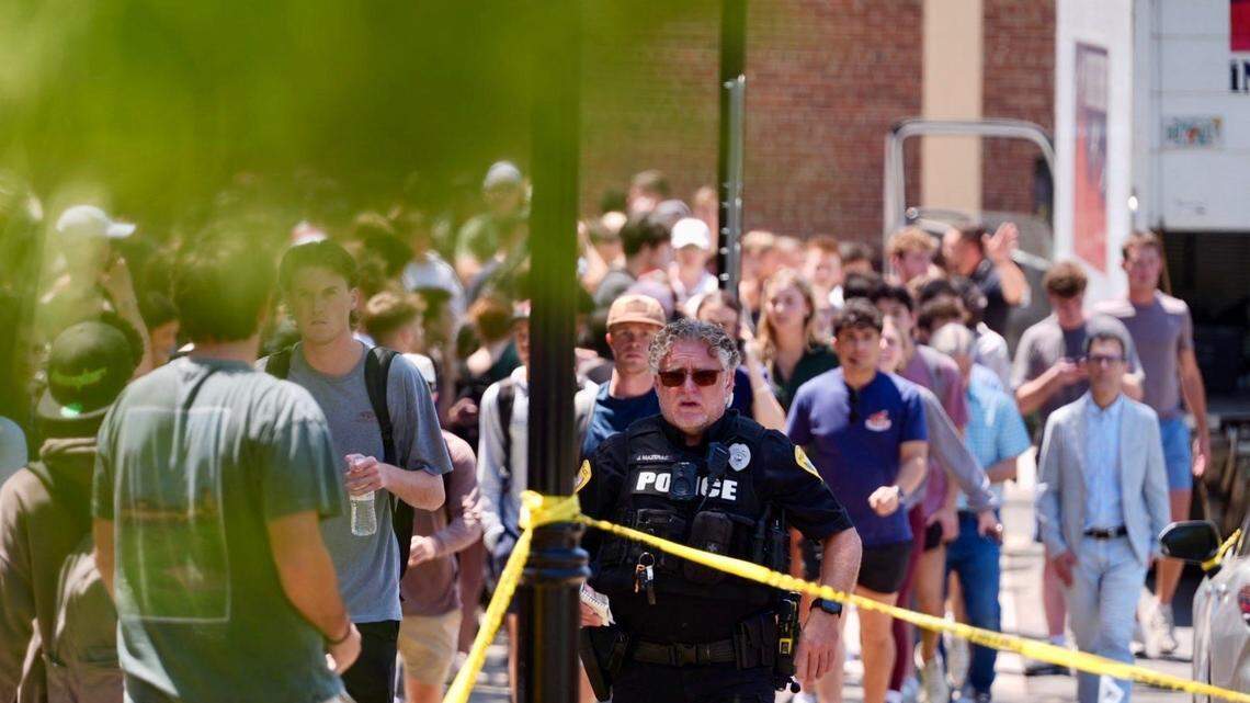 Evacuees on the Florida State University campus after a mass shooting occurred last Thursday.