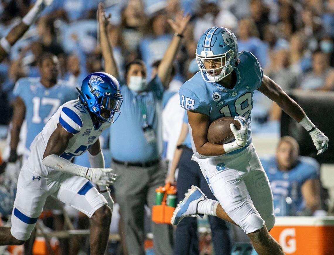 North Carolina tight end Bryson Nesbit (18) races to the end zone for a touchdown after a pass reception from quarterback Jacolby Criswell in the fourth quarter on Saturday, September 11, 2021 at Kenan Stadium in. Chapel Hill, N.C.
