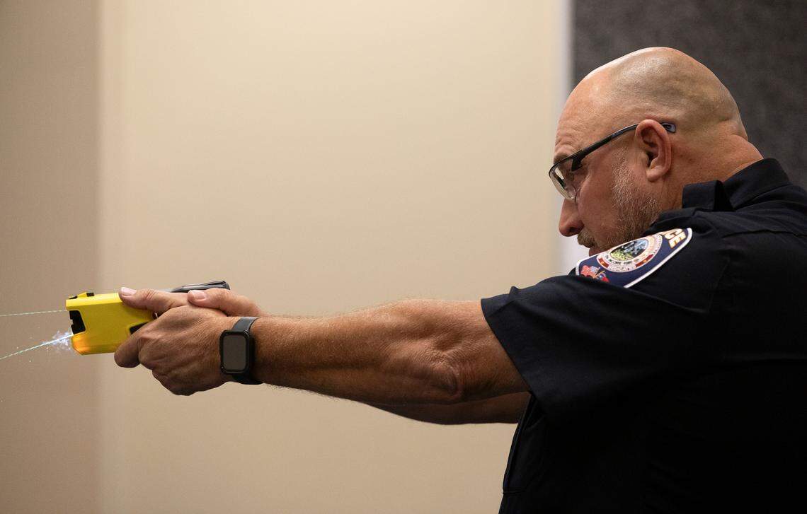 Pinehurst Police Deputy Chief Ken Hall demonstrates the use of a Taser 7 on Tuesday, Oct. 29, 2024, at the Pinehurst Police Department in Pinehurst, N.C.