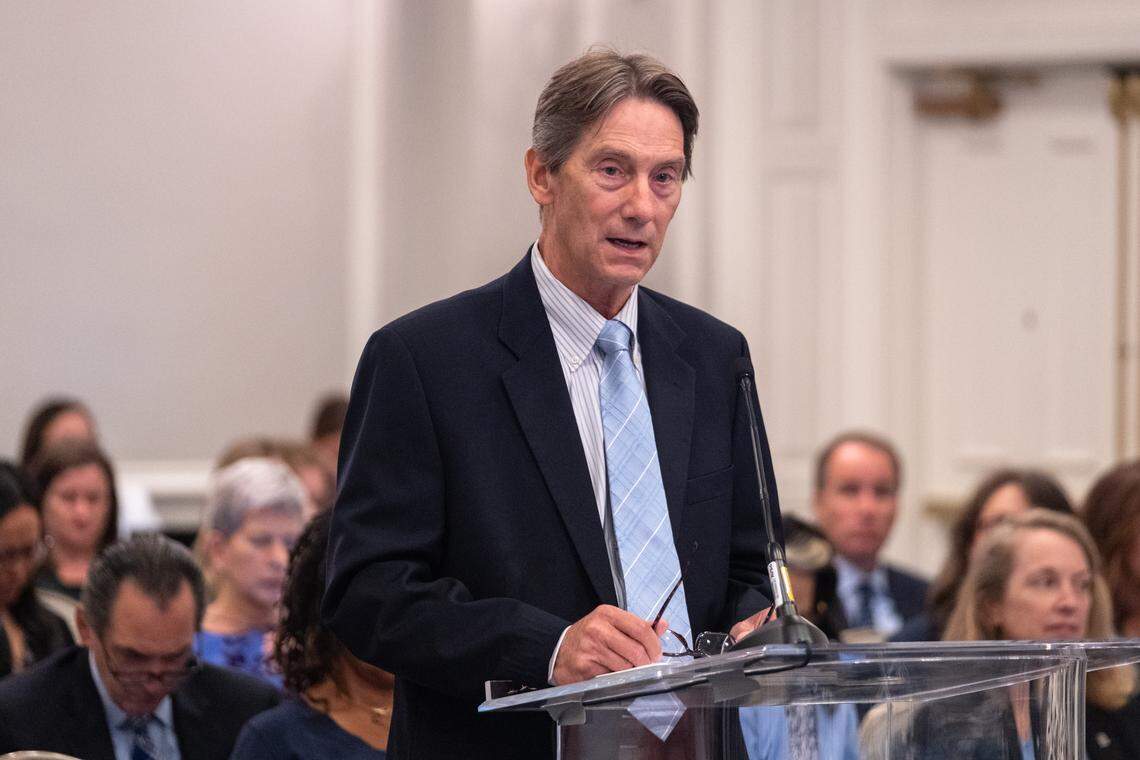 Jim White, Craver Family Dean, College of Arts and Sciences addresses the UNC Board of Trustees in 2023.