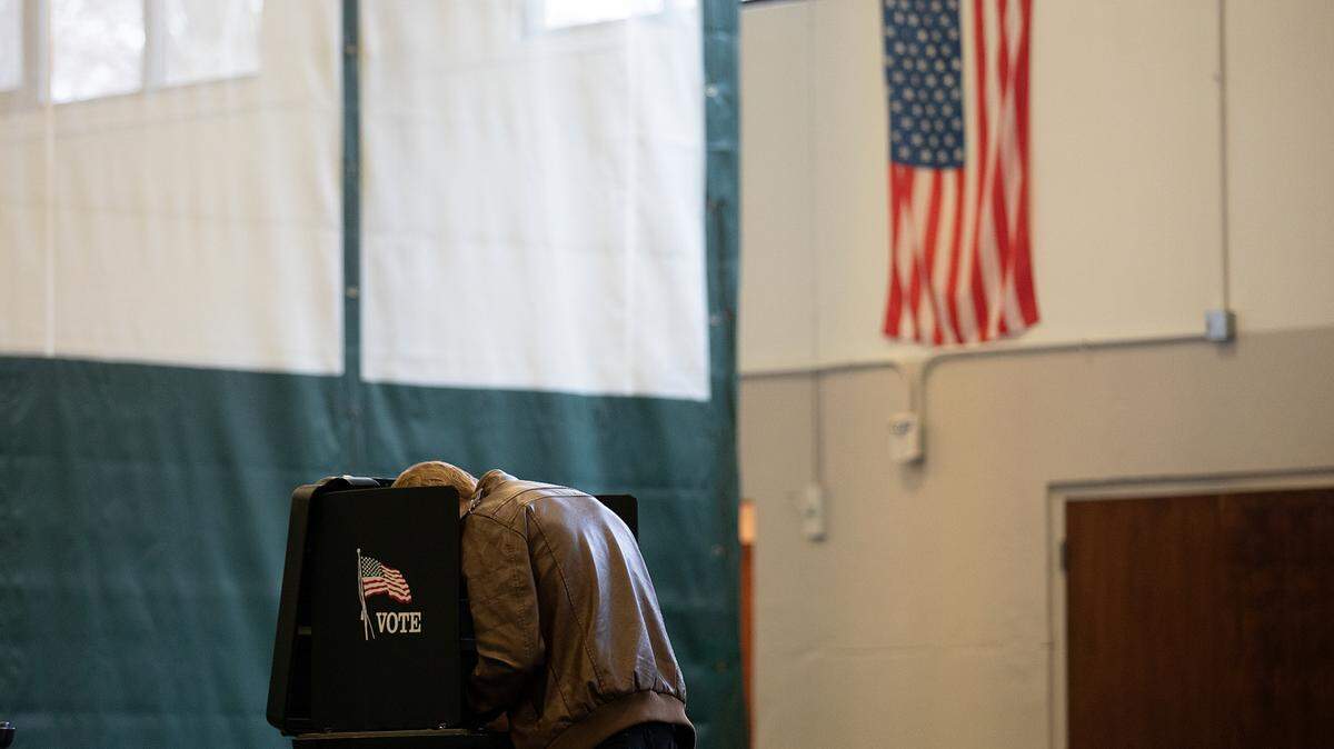A person votes at the Herbert C. Young Community Center in Cary, N.C. on Tuesday, March 5, 2024.
