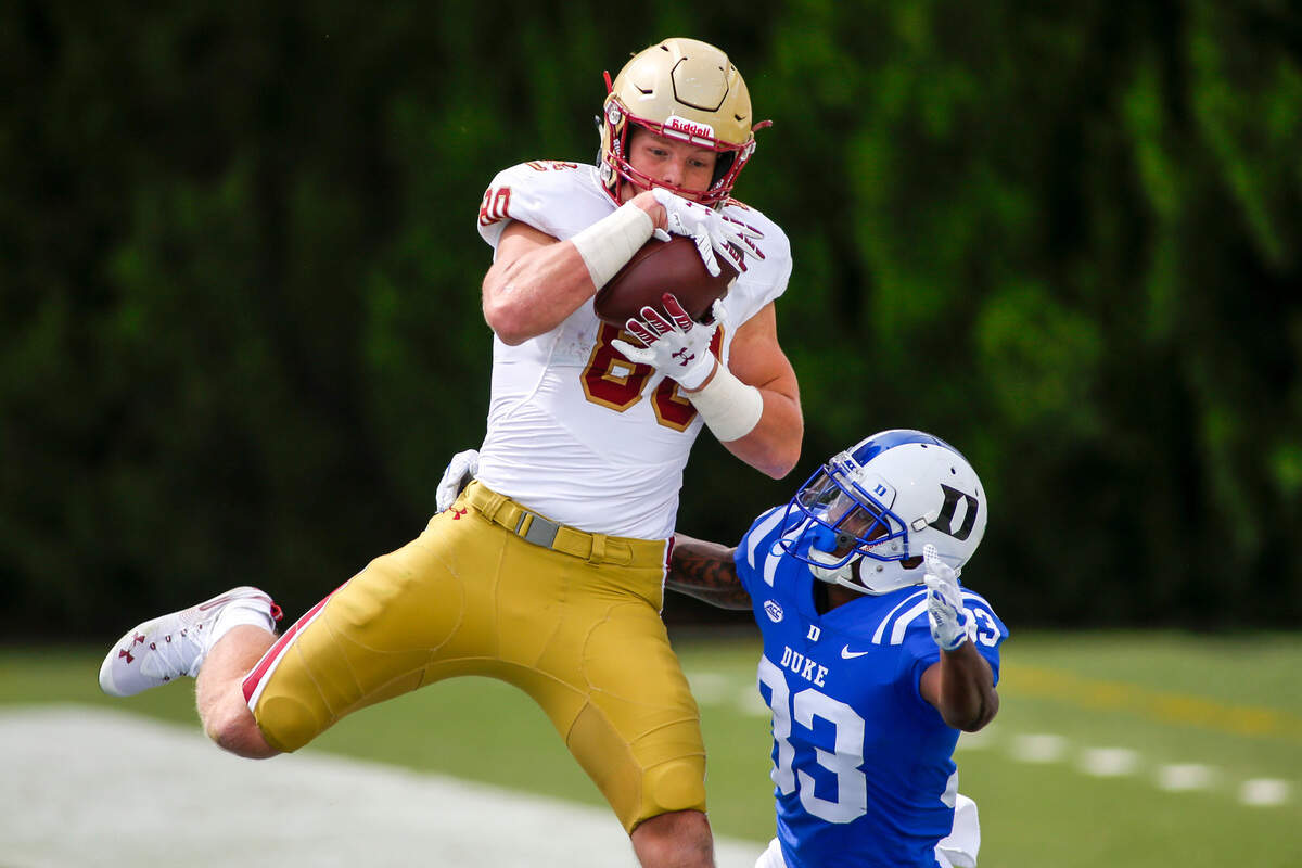 Boston College Eagles tight end Hunter Long (80) catches a touchdown pass against Duke Blue Devils cornerback Leonard Johnson (33) in the third quarter at Wallace Wade Stadium. The Boston College Eagles won 26-6. Mandatory Credit: Nell Redmond-USA TODAY Sports