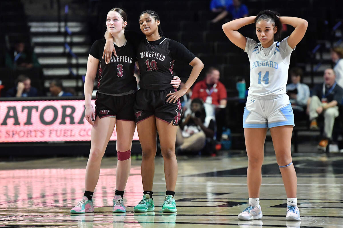 Wakefield’s Nicole Amend (3), Jaya Hamilton (10) and Hoggard’s Tristan Shivers (14) contrast reactions to the Wakefield free throws in the second half. The Wakefield Wolverines and the Hoggard Vikings met in the NCHSAA 4A East Regional Final in Winston-Salem, N.C. on March 12, 2025. Wakefield wins 31-23.