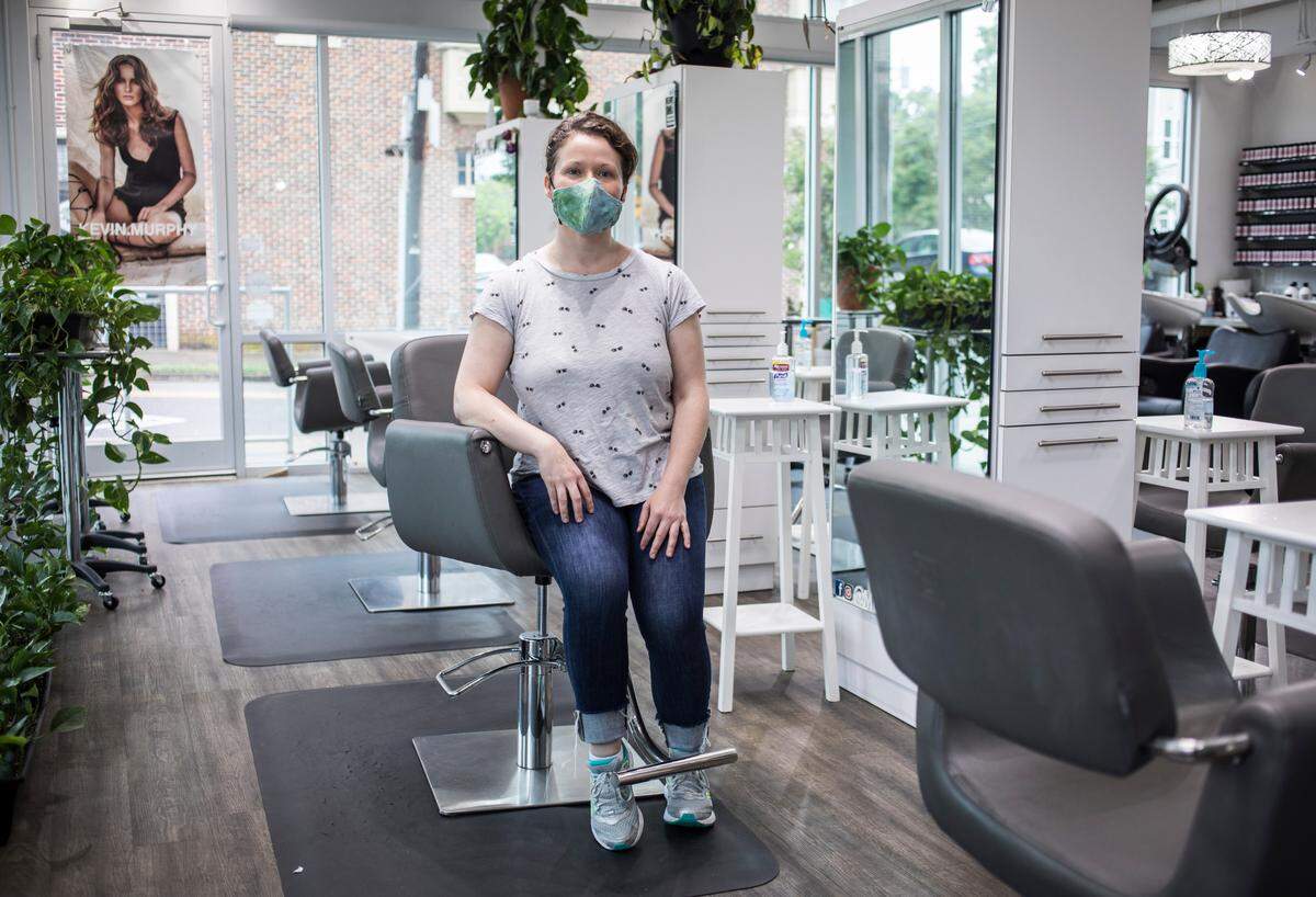 Michelle Ghassemi, owner of Meraki Salon in Raleigh, N.C., poses for a portrait on Thursday, May 21, 2020, the day after Governor Roy Cooper announced that hair salons can operate at 50% capacity as part of Phase Two of re-opening North Carolina.