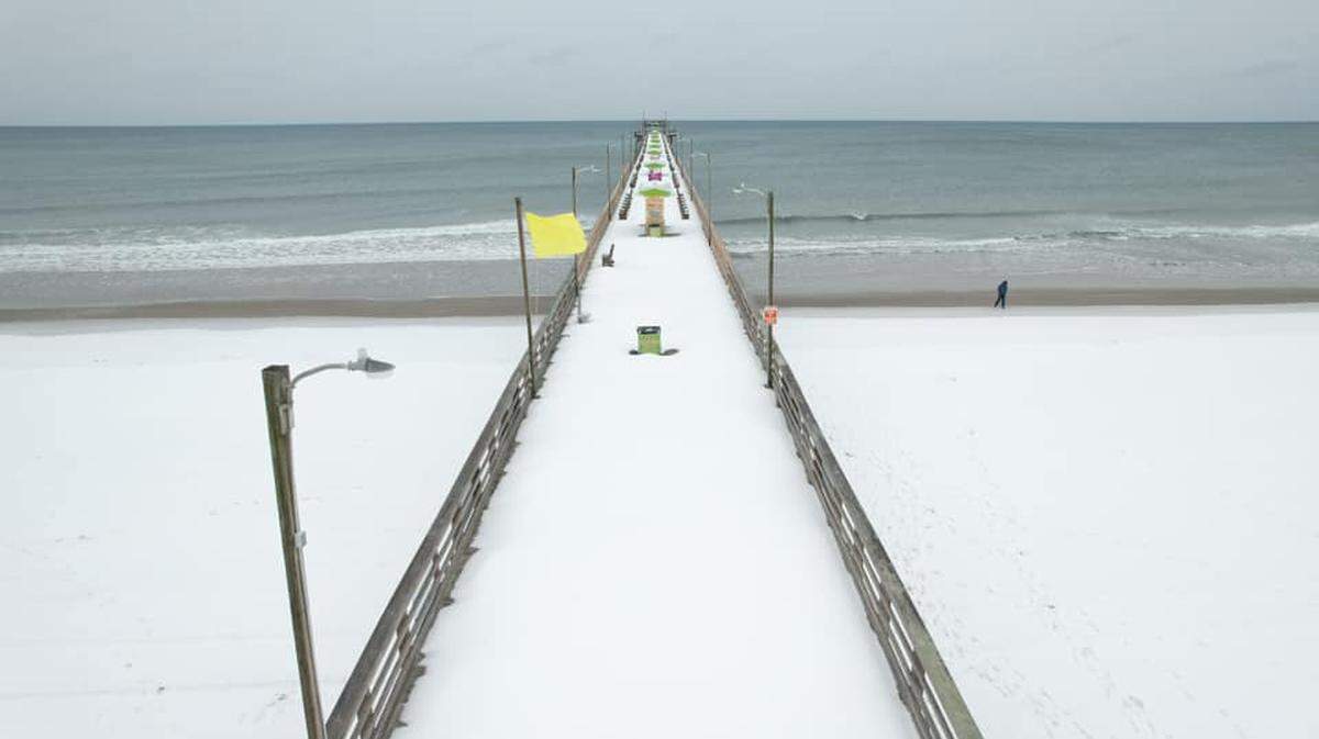 Up to 6 inches of snow fell at Bogue Banks along the central N.C. coast starting Tuesday, Jan. 21. On Wednesday morning, Jan. 22, Bogue Inlet Pier in Emerald Isle was covered in white.