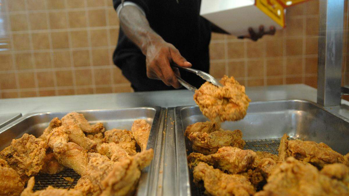 The fried chicken at Bojangles undergoes about a 12-hour process, where the chicken is tumbled and seasoned and marinated before frying.