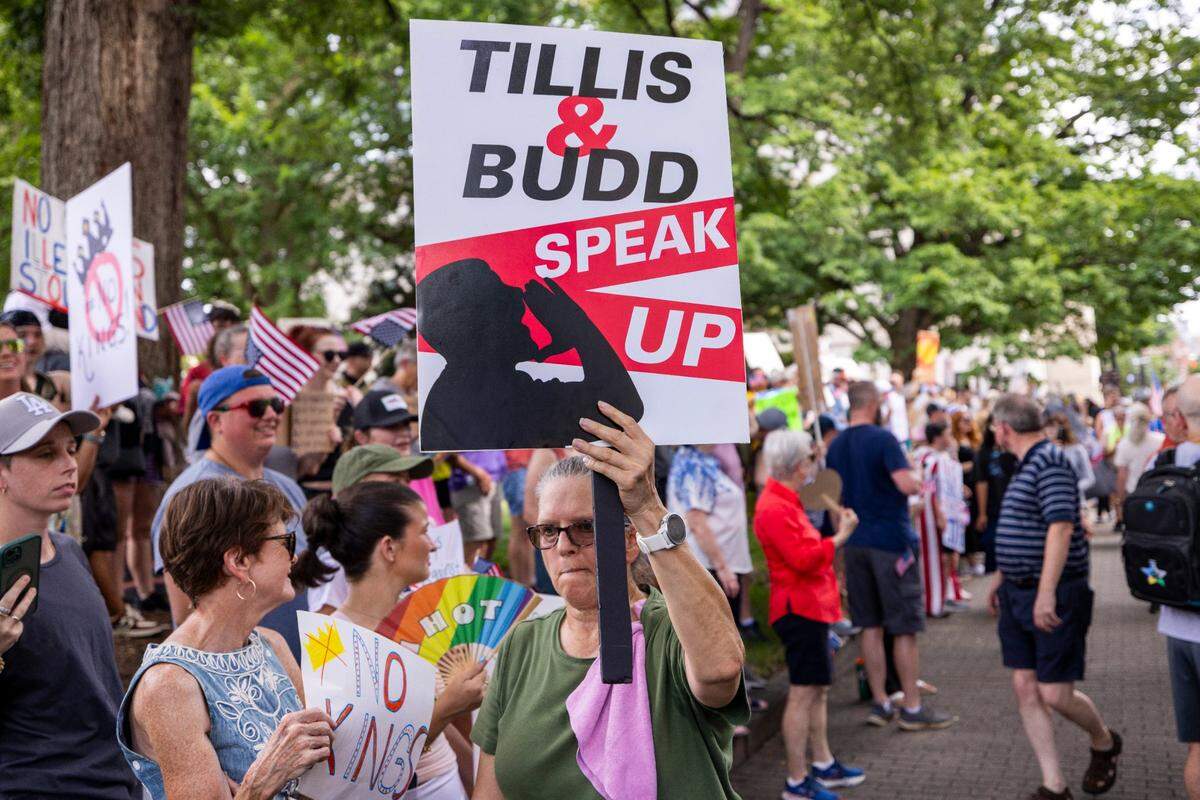 Hundreds of demonstrators rally at the North Carolina State Capitol on Saturday, June 14, 2025. The event was one of dozens held across the state and hundreds nationwide during what organizers called a nationwide day of defiance against the Trump administration.