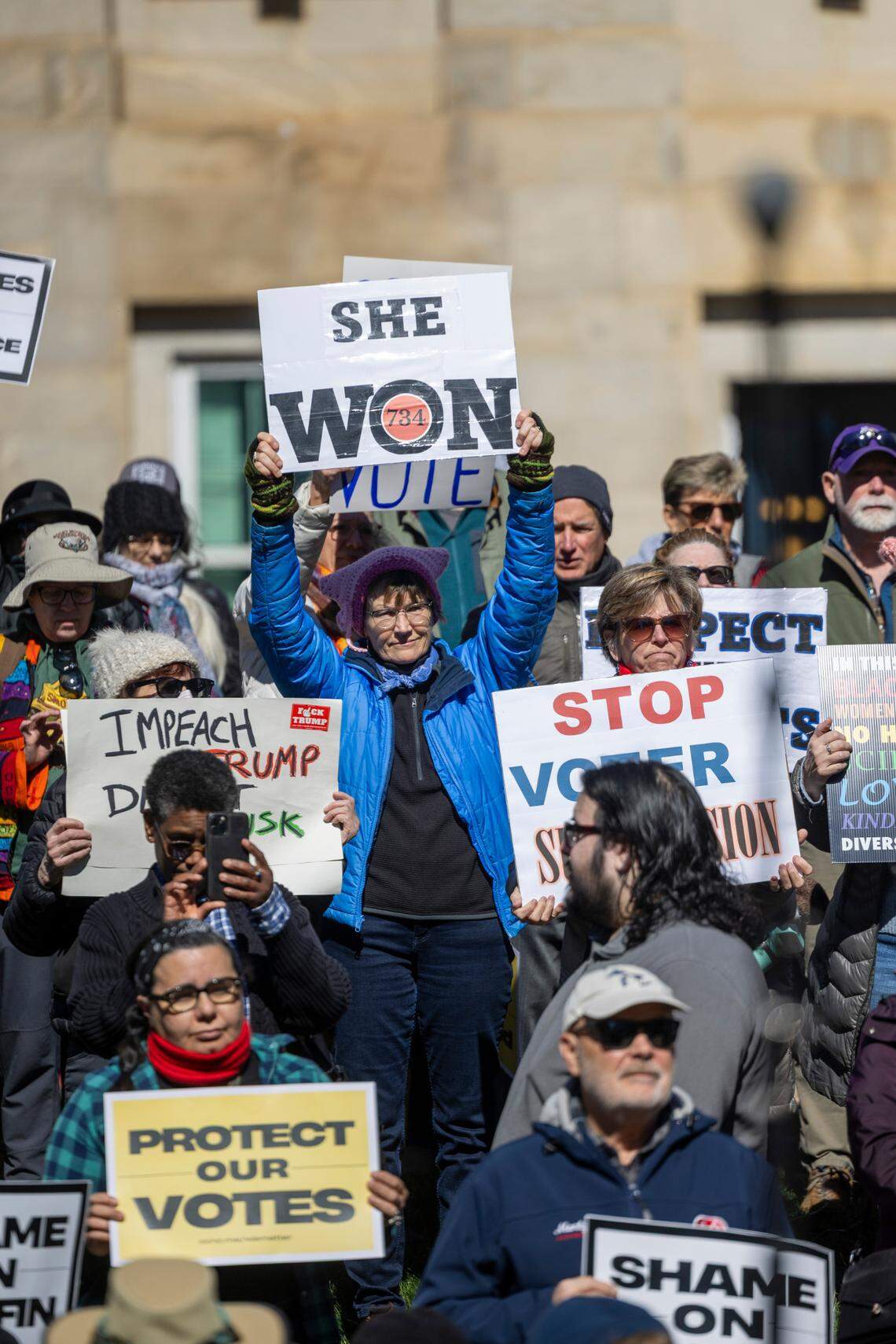 Hundreds of demonstrators rally at the North Carolina State Capitol on Monday, Feb. 17, 2025.