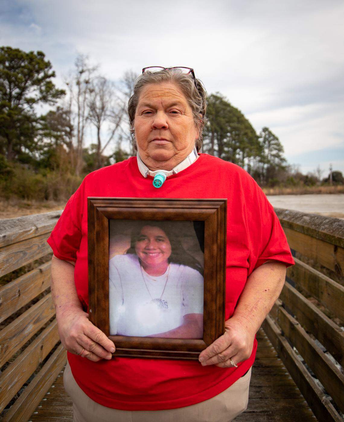 Angela Baxley holds a photo of her niece, Casey Young. Young found dead in the woods in Robeson County on June 15, 2009. She was 21. Police ruled the case a suicide, but her family believe she was killed. Baxley is secretary of Shatter the Silence, an organization that advocates for justice for missing and murdered Indigenous people in North Carolina.