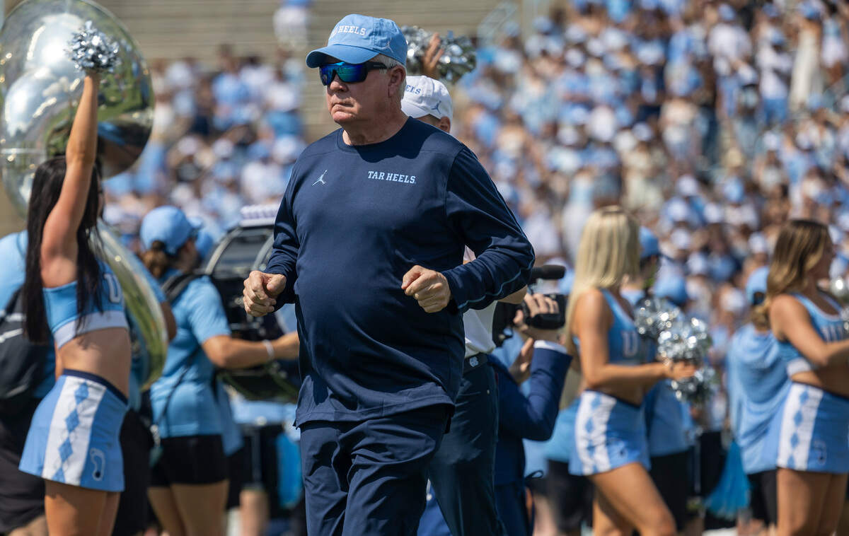 North Carolina coach Mack Brown enters the stadium following his players for the Tar Heels’ game against James Madison on Saturday, September 21, 2024 at Kenan Stadium in Chapel Hill, N.C.