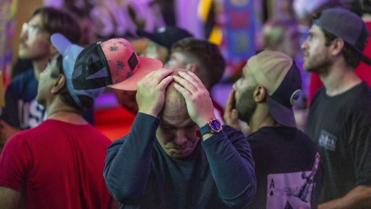 American soccer fans at Olé Sports Bar & Lounge in Raleigh watch as their hopes for a U.S. victory slip away during the United States' 4-1 loss to Belgium in the Round of 16 of the 2026 FIFA World Cup on Monday, July 6, 2026, at Lumen Field in Seattle, Washington.