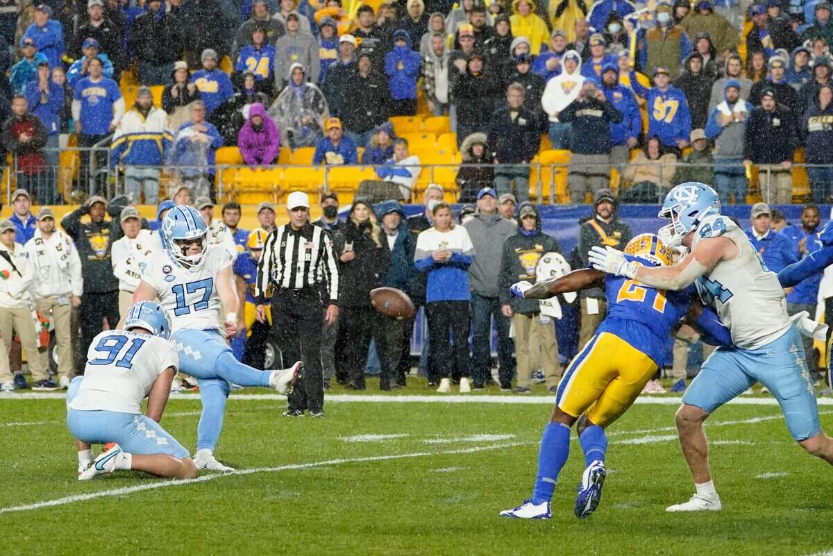 North Carolina’s Grayson Atkins (17) makes a field goal late in regulation in an NCAA college football game against Pittsburgh, Thursday, Nov. 11, 2021, in Pittsburgh. Pittsburgh won 30-23 in overtime. (AP Photo/Keith Srakocic)