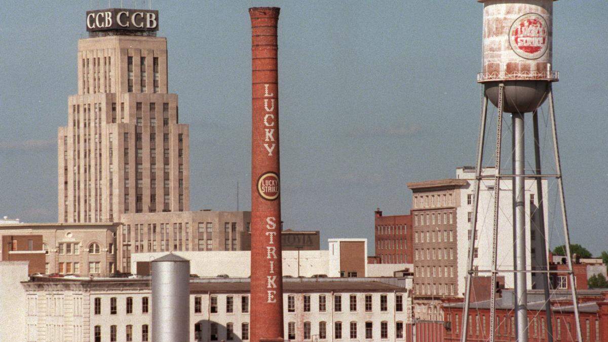 The American Tobacco complex’s Lucky Strike smokestack and the Durhams skyline, photographed in 2000.