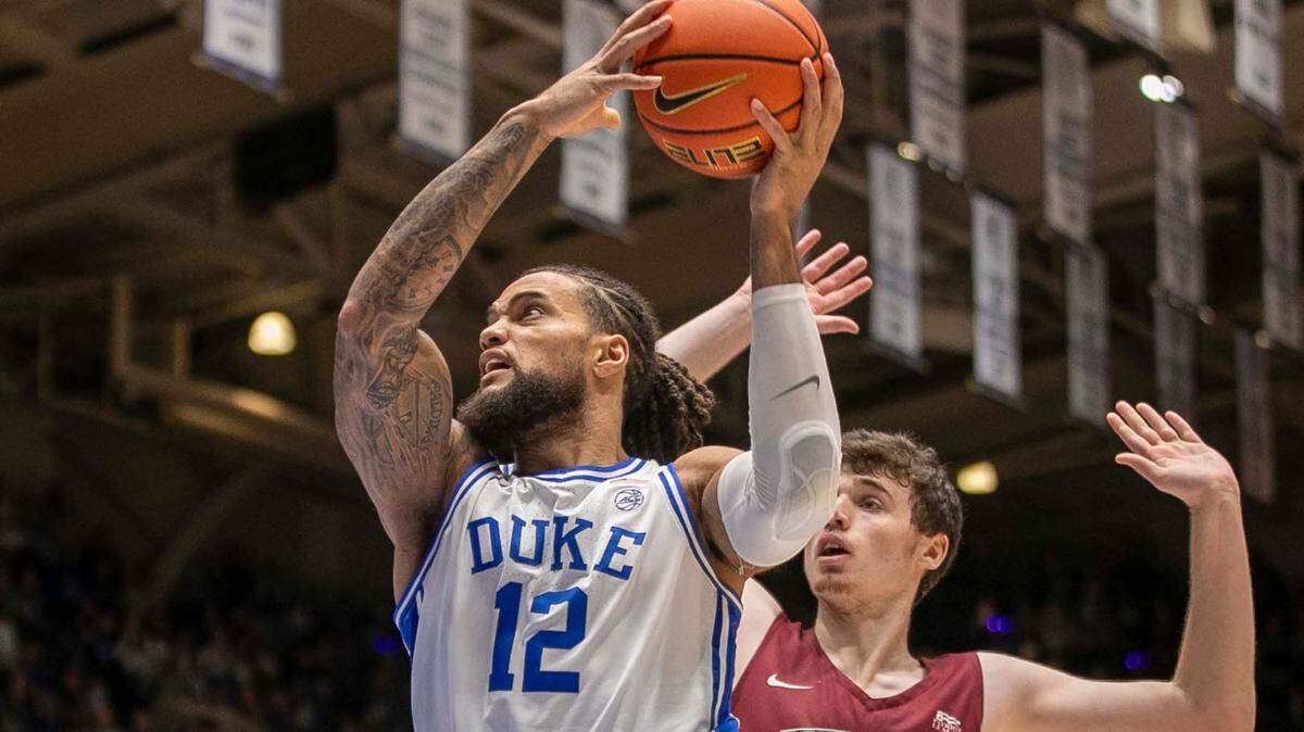 Duke’s Theo John (12) drives to the basket against Lafayette’s Neal Quinn (45) in the second half on Friday, November 19, 2021 at Cameron Indoor Stadium in Durham, N.C.