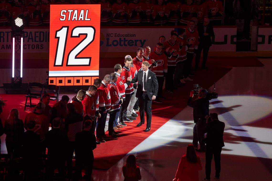 Eric Staal is greeted by former Carolina Hurricanes teammates, including Tuomo Ruutu, as he arrives to have his jersey retired on Sunday, January 12, 2025 at Lenovo Center in Raleigh, N.C.