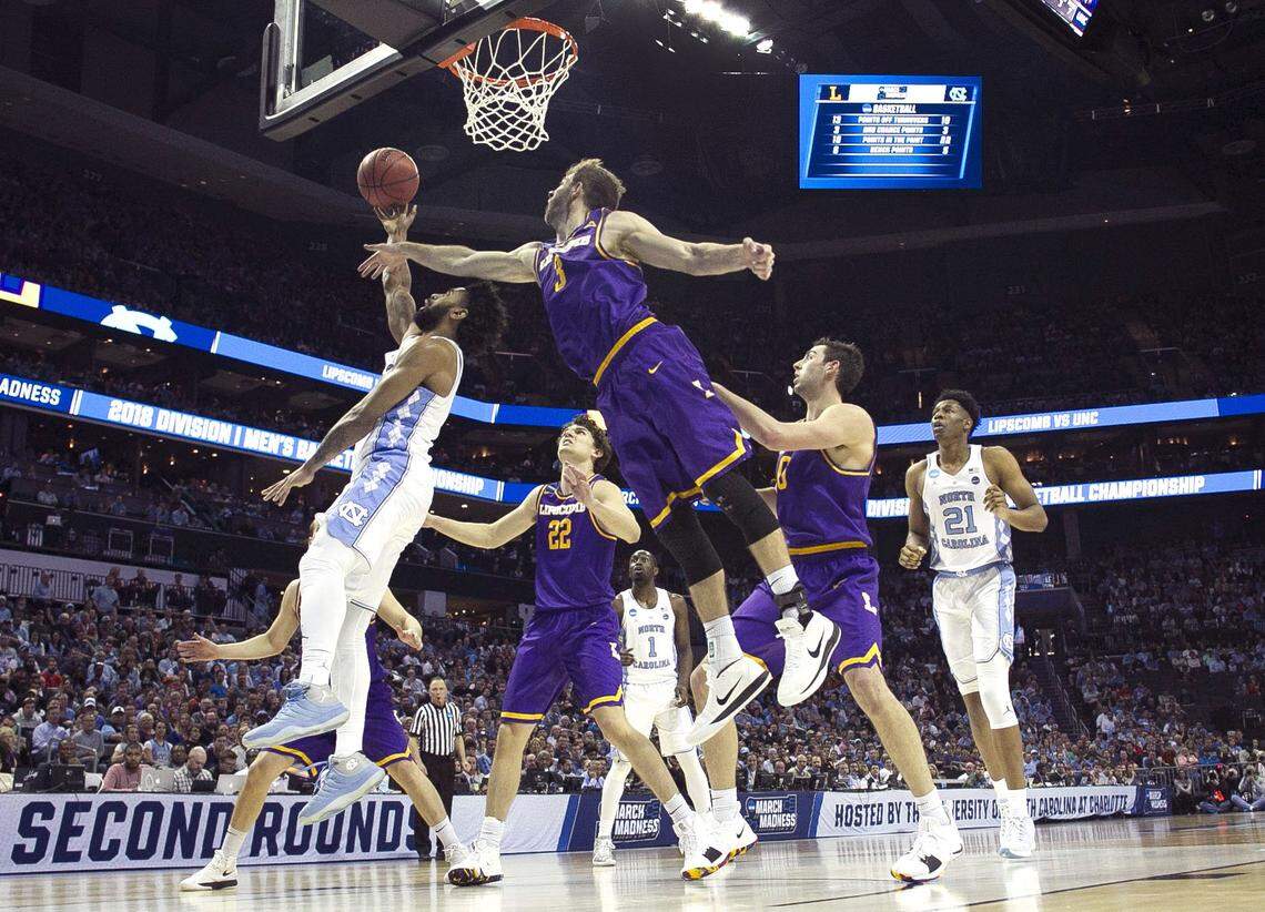 North Carolina's Joel Berry II (2) breaks to the basket past Lipscomb's Michael Buckland (3) in the first half.