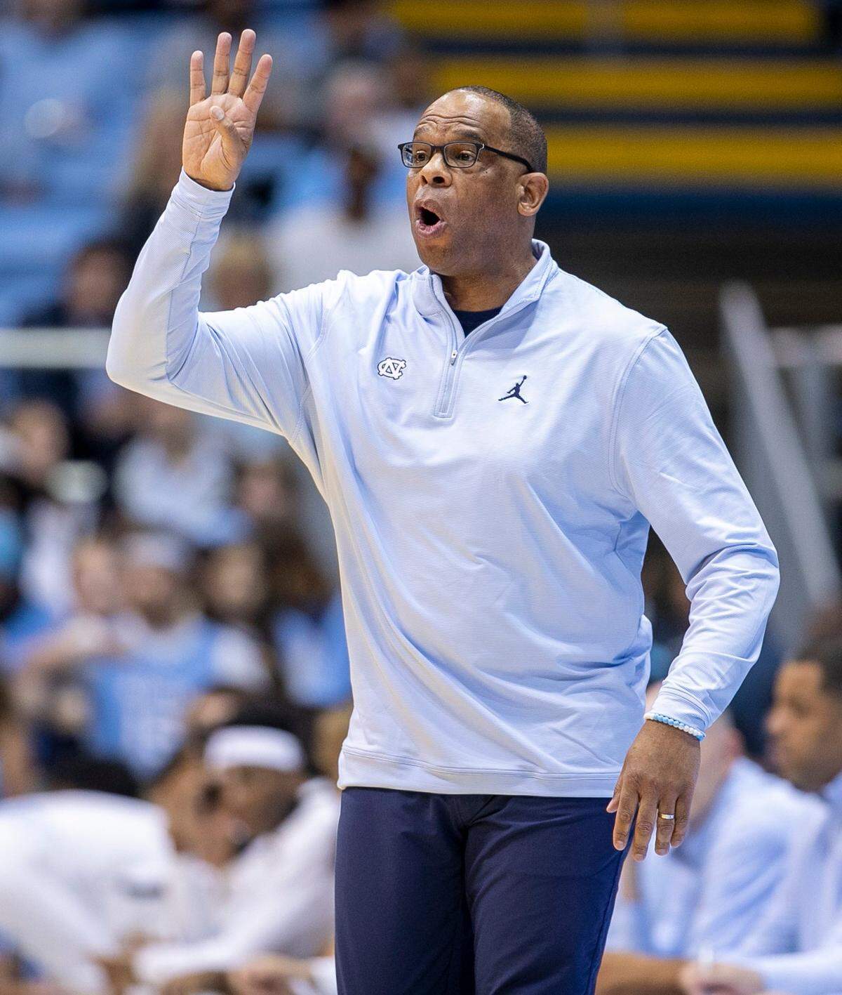 North Carolina coach Hubert Davis directs his team on offense in the first half against College of Charleston on Friday, November 11, 2022 at the Smith Center in Chapel Hill, N.C.