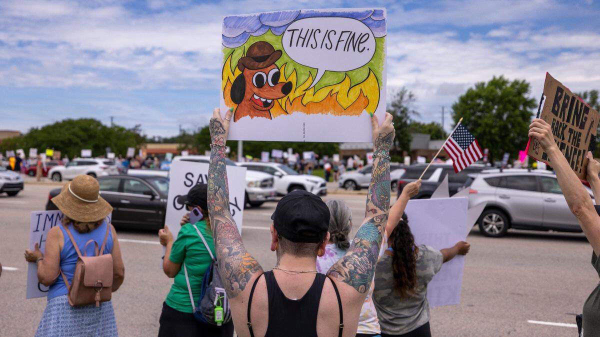 More than 1500 demonstrators lined Capital Boulevard to protest the policies and tactics of the of President Donald Trump on Saturday, June 14, 2025 near Triangle Town Center in Raleigh. The Raleigh “No Kings” rally was one of dozens across North Carolina and hundreds nationwide on what organizers called a nationwide day of defiance against the Trump administration.