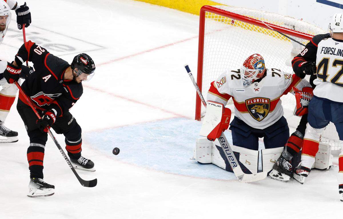 Carolina’s Sebastian Aho (20) can’t get to the puck during the second period of the Carolina Hurricanes’ game against the Florida Panthers in Game 2 of the Eastern Conference Final at the Lenovo Center in Raleigh, N.C., Thursday, May 22, 2025.