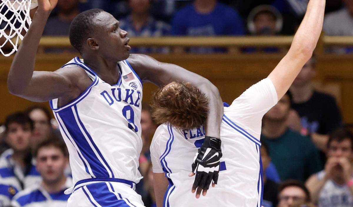 Duke’s Khaman Maluach (9) connects with Cooper Flagg (2) as they defend during the second half of Duke’s 103-47 victory over Arizona State in the Brotherhood Run Charity Game at Cameron Indoor Stadium in Durham, N.C., Sunday, Oct. 27, 2024.