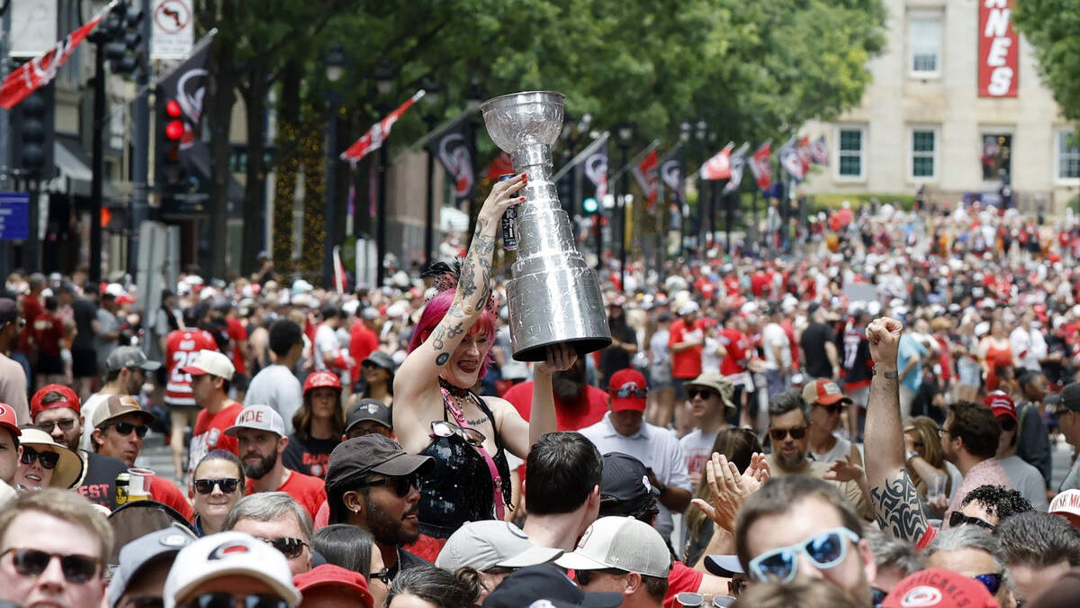 Fans fill Fayetteville St. in downtown Raleigh cheer on the Canes during a rally for the Carolina Hurricanes Saturday, June 20, 2026.