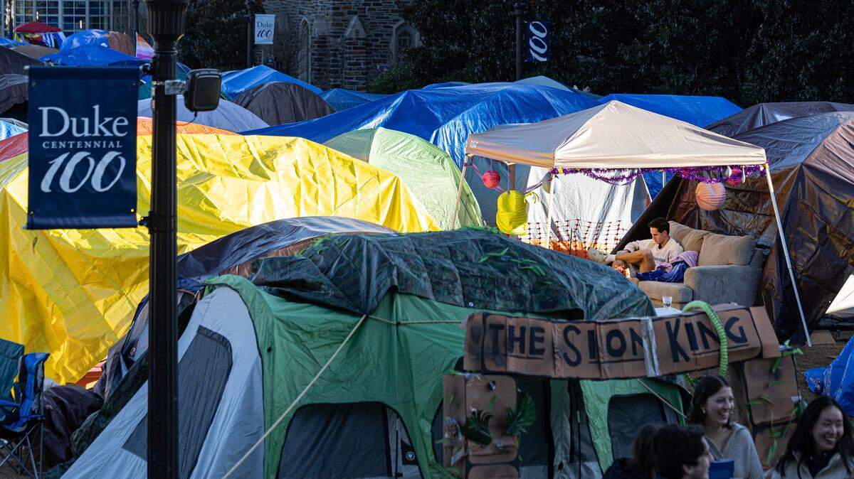 Duke senior Zach Beischer works in Krzyzewskiville at Duke University in Durham, N.C., Tuesday, Jan. 28, 2025. The is the 39th year of tenting for students who want to attend the game against UNC. One hundred thirty tents were set up on Jan. 12, with 12 students per tent. It is the only way undergraduates can go to the game.