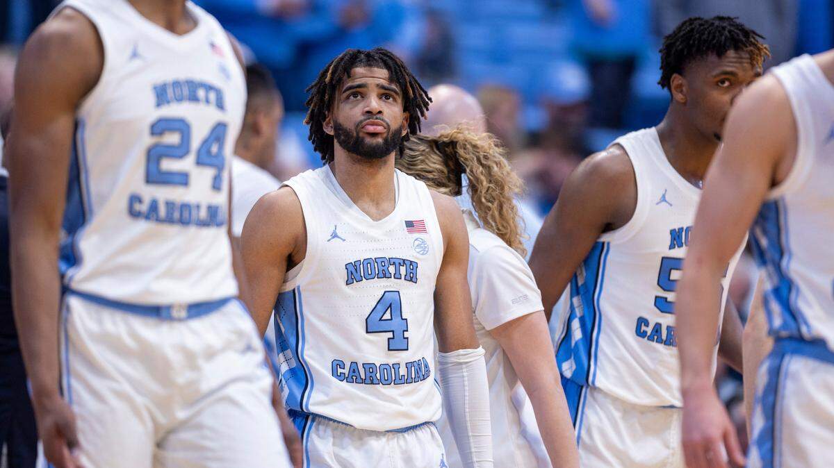 Down by five points with 23 seconds to play, North Carolina’s R.J. Davis (4) glances as the score board following a time out on Tuesday, February 6, 2024 at the Dean E. Smith Center in Chapel Hill, N.C. Clemson defeated North Carolina 80-76, handing the Tar Heels their first home loss of the season.