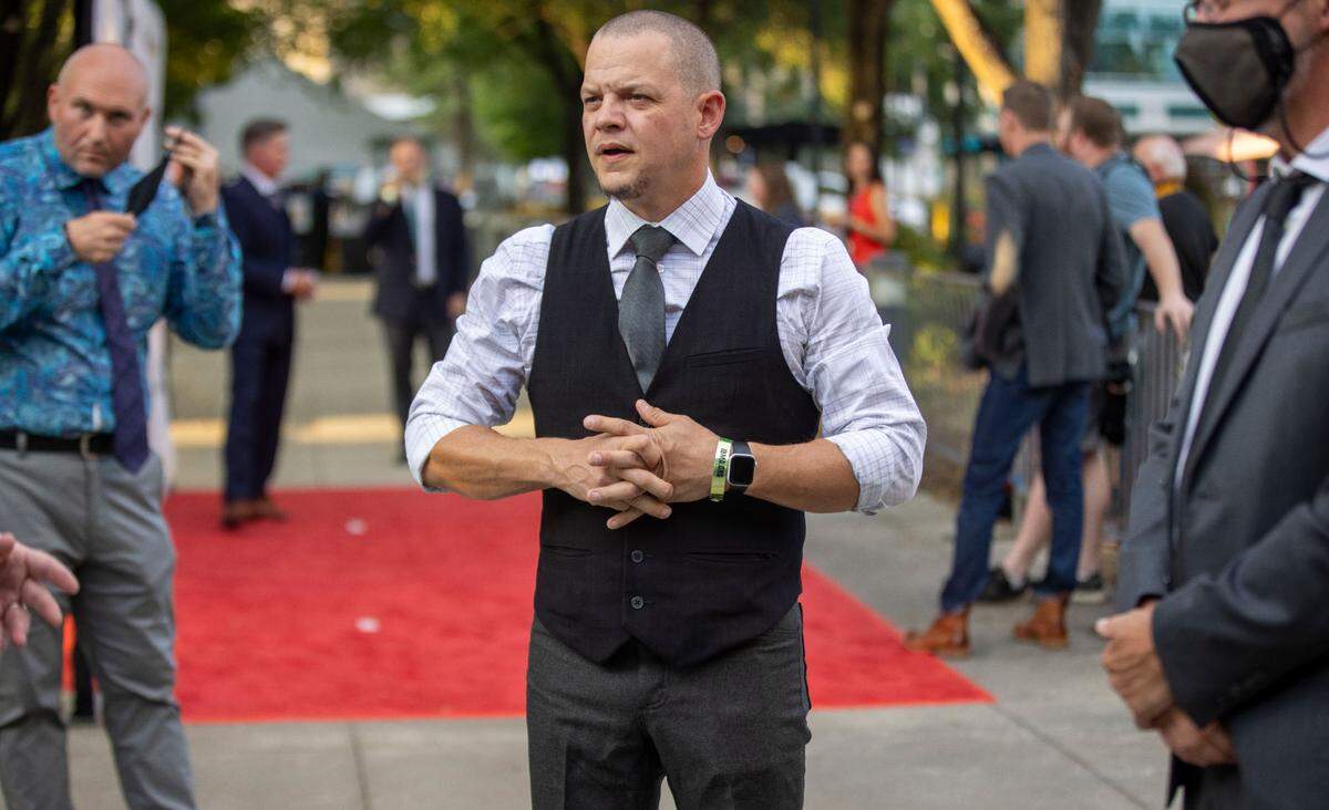 Caleb Smith of Balsam Range does an interview on the red carpet as they arrive for the IBMA Bluegrass Music Awards at Duke Energy Center on Thursday, September 29, 2021 in Raleigh, N.C.