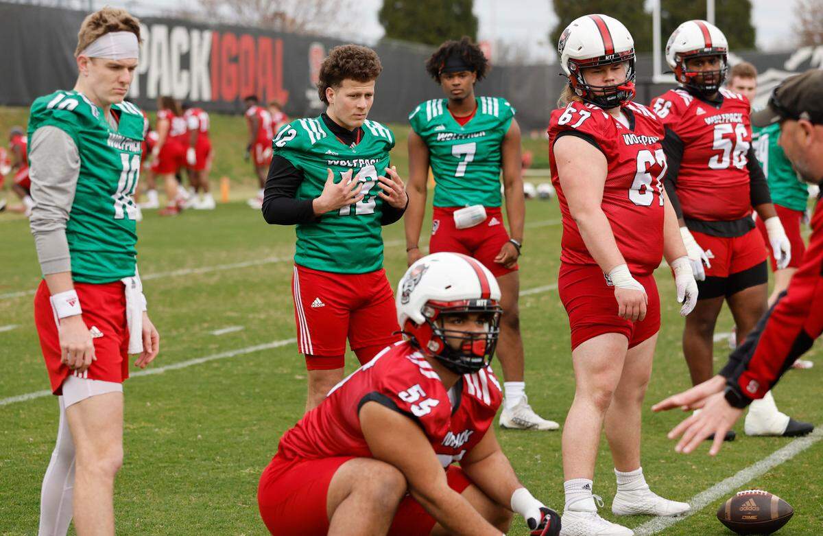N.C. State quarterback Lex Thomas (12) watches during the Wolfpack’s first spring practice in Raleigh, N.C., Wednesday, March 1, 2023.