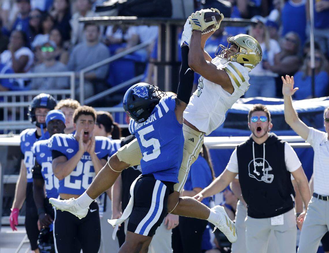 Georgia Tech wide receiver Isiah Canion (4) pulls in a 30-yard reception while defended by Duke cornerback Kimari Robinson (5) during the second half of Georgia Tech’s 27-18 victory over Duke at Wallace Wade Stadium in Durham, N.C., Saturday, Oct. 18, 2025.