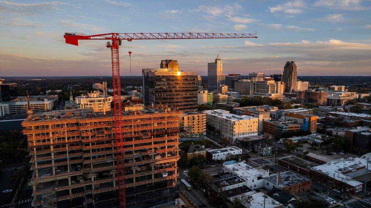 A construction crane towers over downtown Raleigh Monday, Nov. 14, 2022. The crane is located at the 400H project on Hillsborough Street.